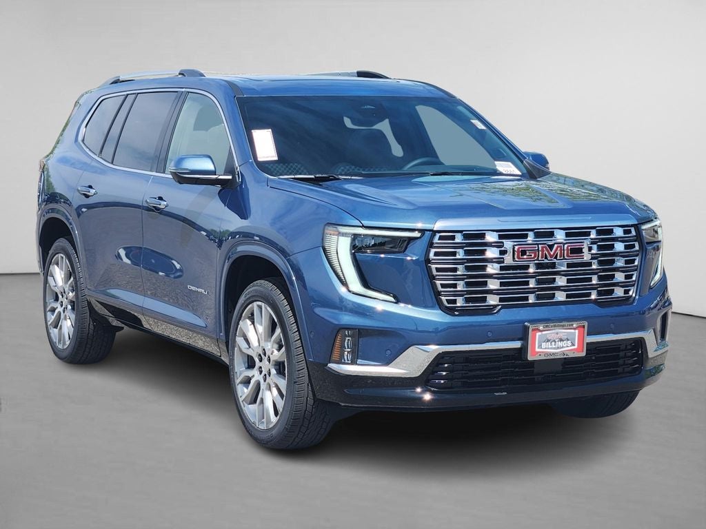 2026 GMC Acadia Denali in Downpour Metallic — front three-quarter view