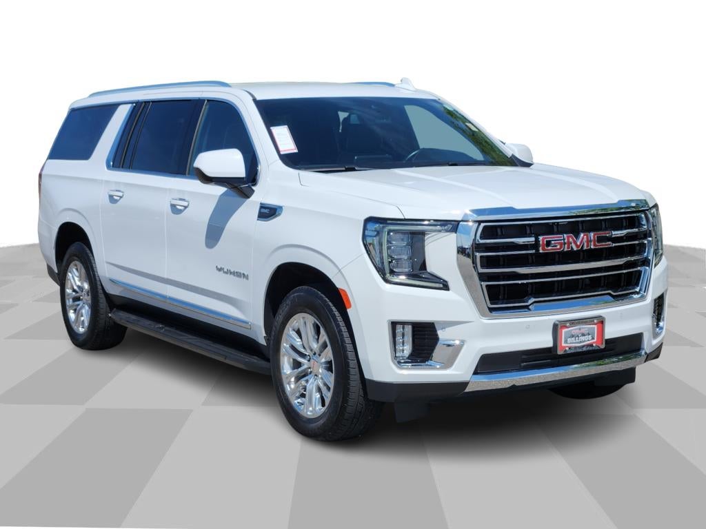2023 GMC Yukon XL SLT in Summit White — front three-quarter view