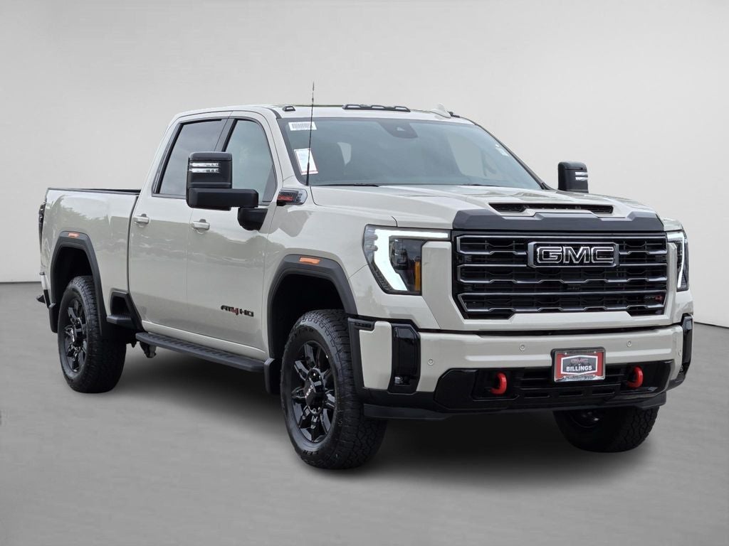 2026 GMC Sierra 2500 HD AT4 in Coastal Dune — front three-quarter view