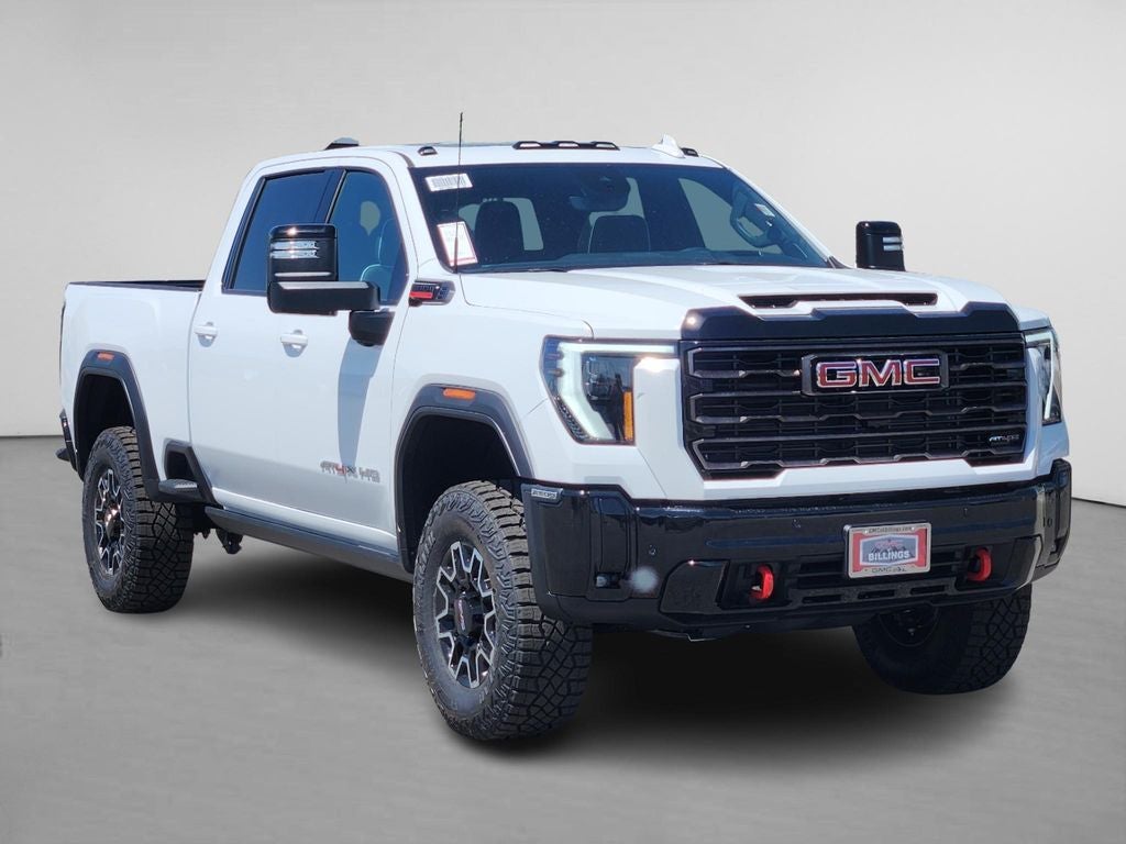 2026 GMC Sierra 2500 HD AT4X in Summit White — front three-quarter view