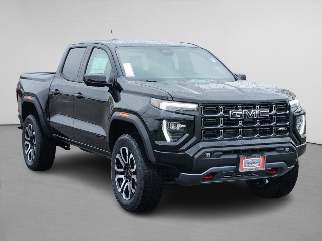2026 GMC Canyon AT4 in Onyx Black — front three-quarter view