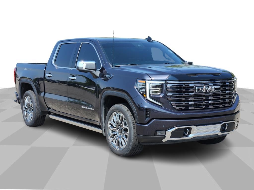 2025 GMC Sierra 1500 Denali Ultimate in Titanium Rush Metallic — front three-quarter view