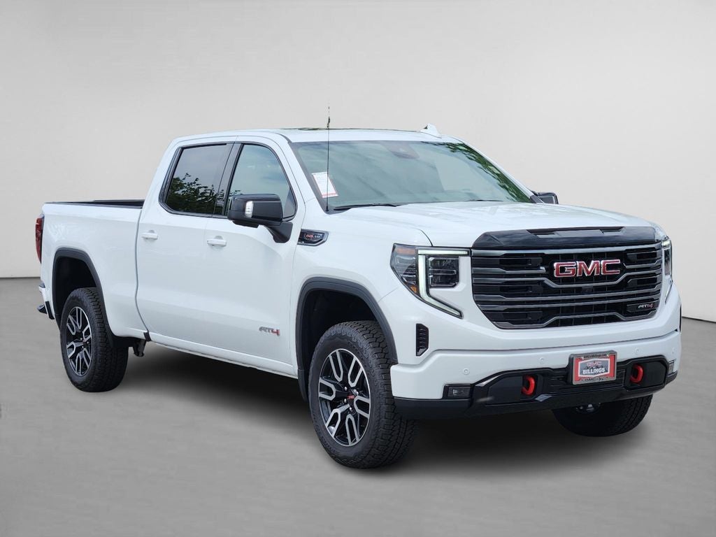 2026 GMC Sierra 1500 AT4 in Summit White — front three-quarter view